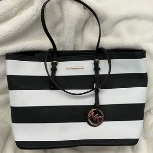 Large shoulder bag Michael Kours.  Stripped white black.
